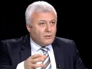 Tuncay Özkandan sarıklı polise tepki